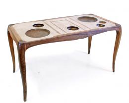 Wood dishes are part of the top table - Marcantonio design